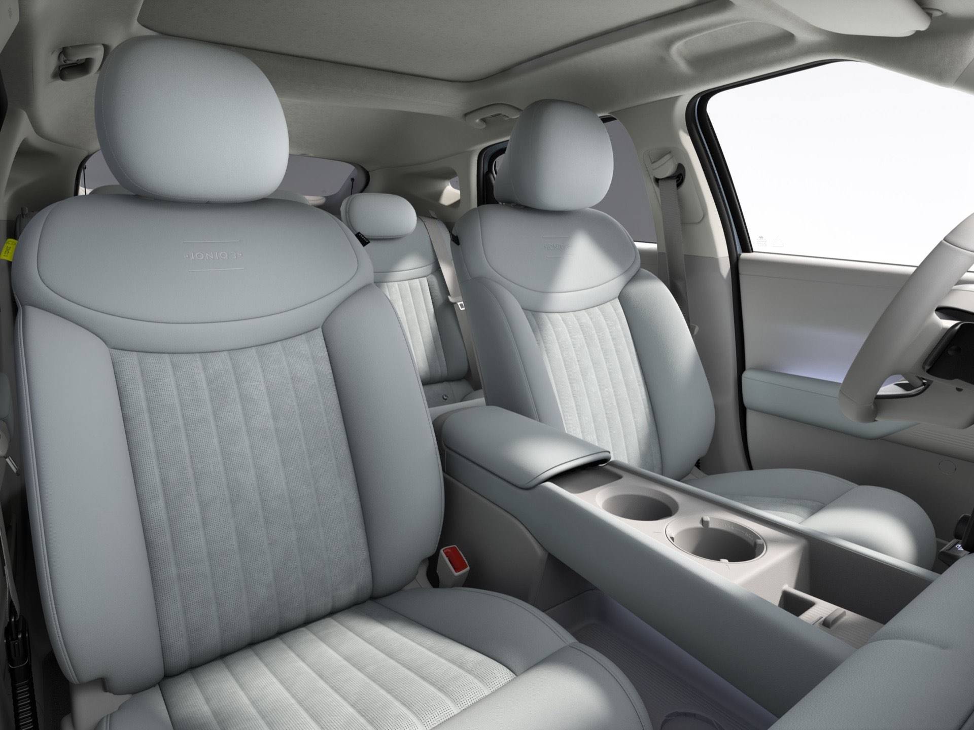 The two front seats in grey inside the&nbsp;Hyundai IONIQ 3.